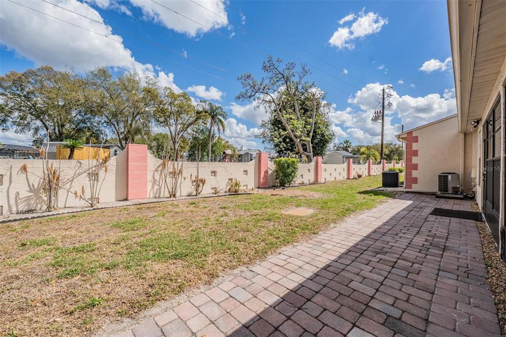 11308 Versailles Lane, Unit C Port Richey, FL 34668 - Photo 25 of 33 a view of a volley ball court