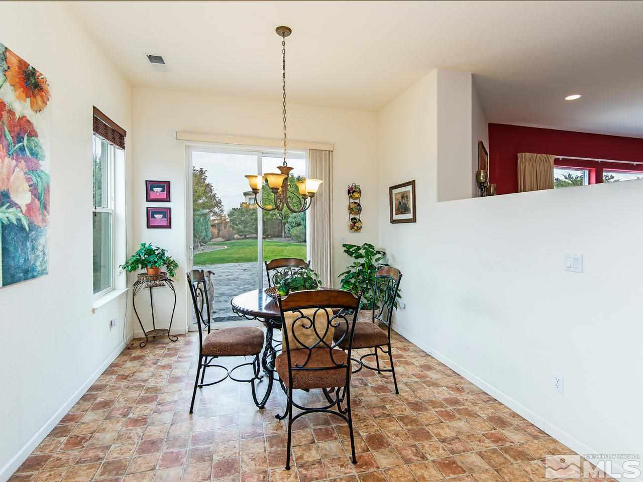 1635 Crater Court Reno, NV 89521 - Photo 11 of 25 a dining room with furniture and window