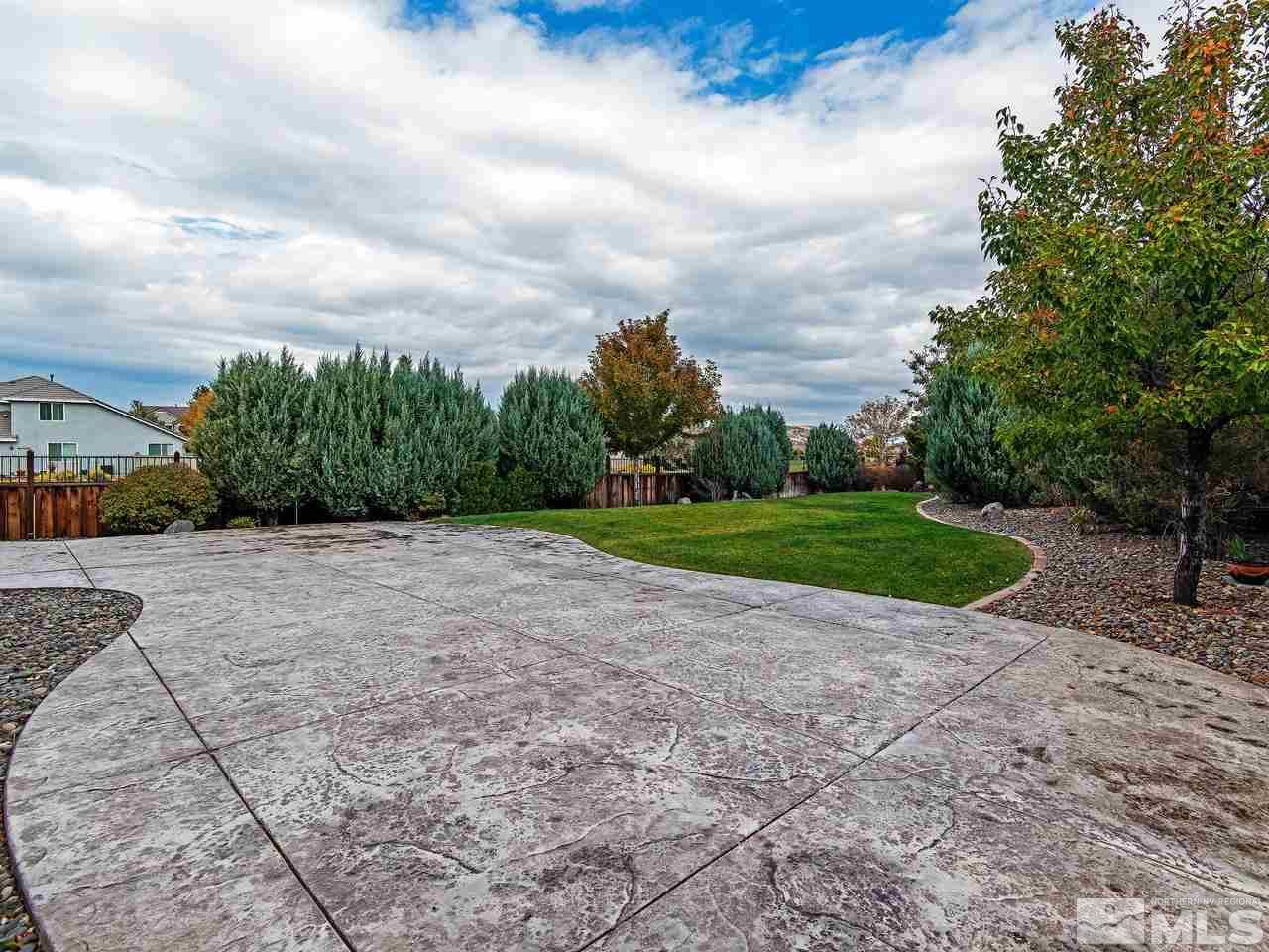 1635 Crater Court Reno, NV 89521 - Photo 22 of 25 a view of a backyard with green space