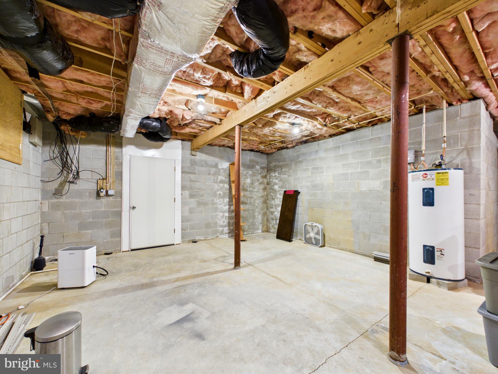 3298 Canterbury Road Milford, DE 19963 - Photo 41 of 74 Basement Storage & Stairs