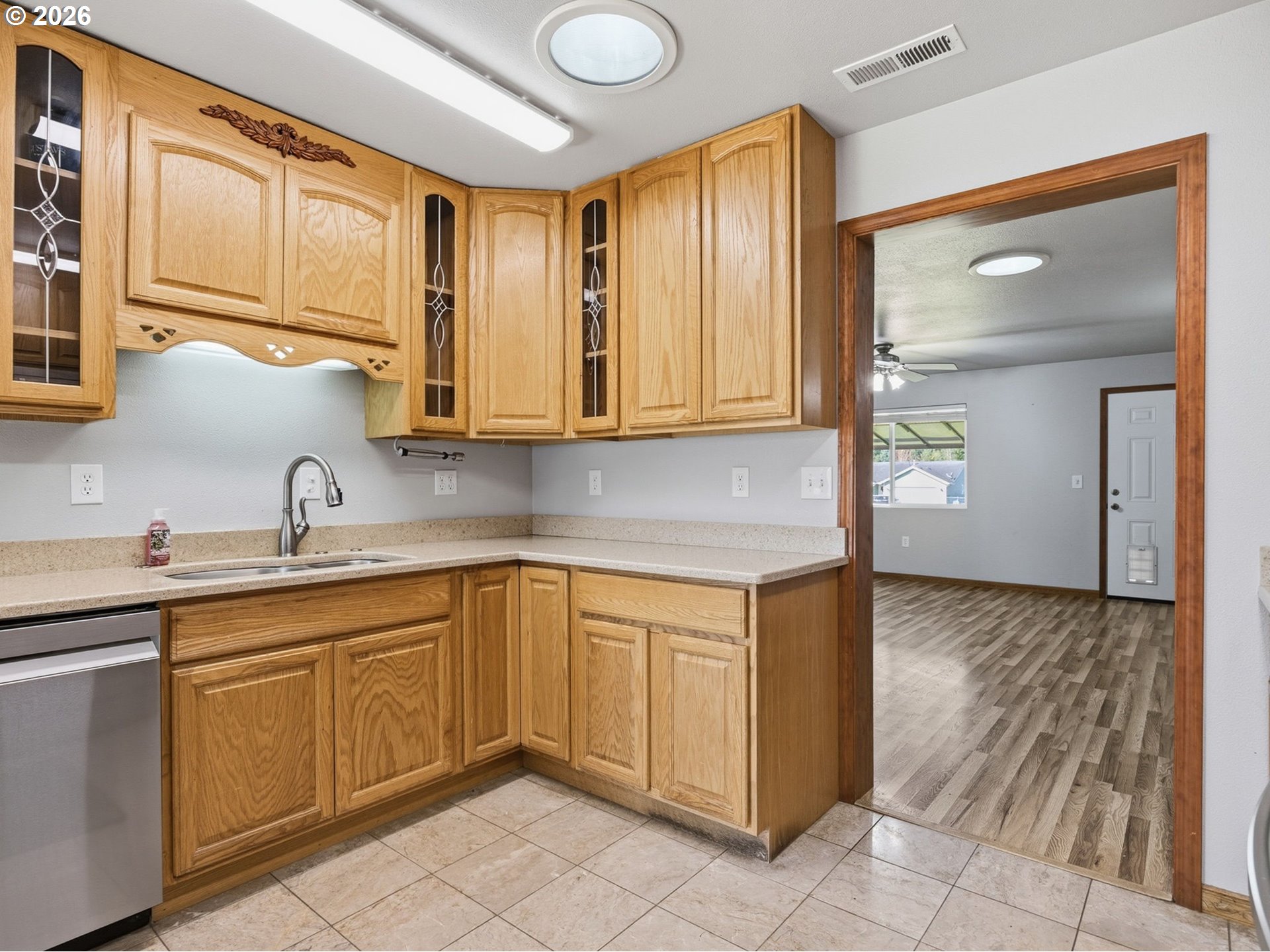 92938 Amie Loop Astoria, OR 97103 - Photo 13 of 42 a kitchen with a sink cabinets and wooden floor