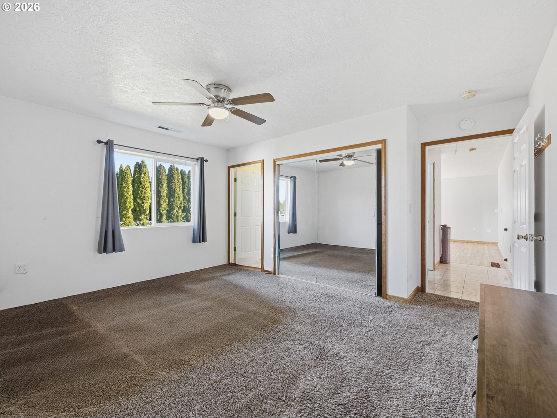 92938 Amie Loop Astoria, OR 97103 - Photo 17 of 42 a view of an empty room with a window