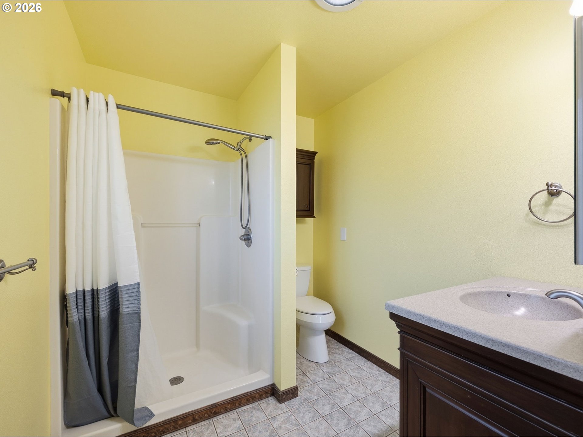 92938 Amie Loop Astoria, OR 97103 - Photo 19 of 42 a bathroom with a granite countertop sink toilet and shower