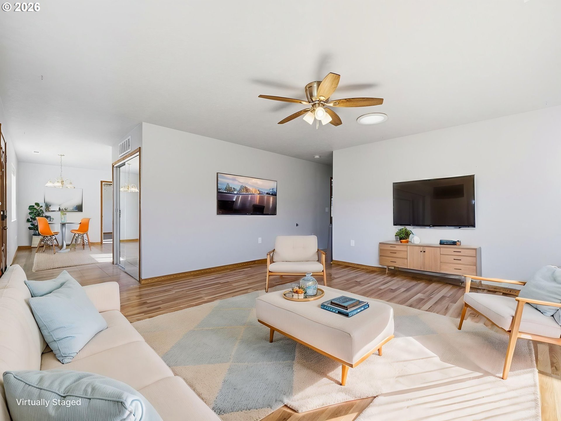 92938 Amie Loop Astoria, OR 97103 - Photo 22 of 42 a living room with furniture and a flat screen tv