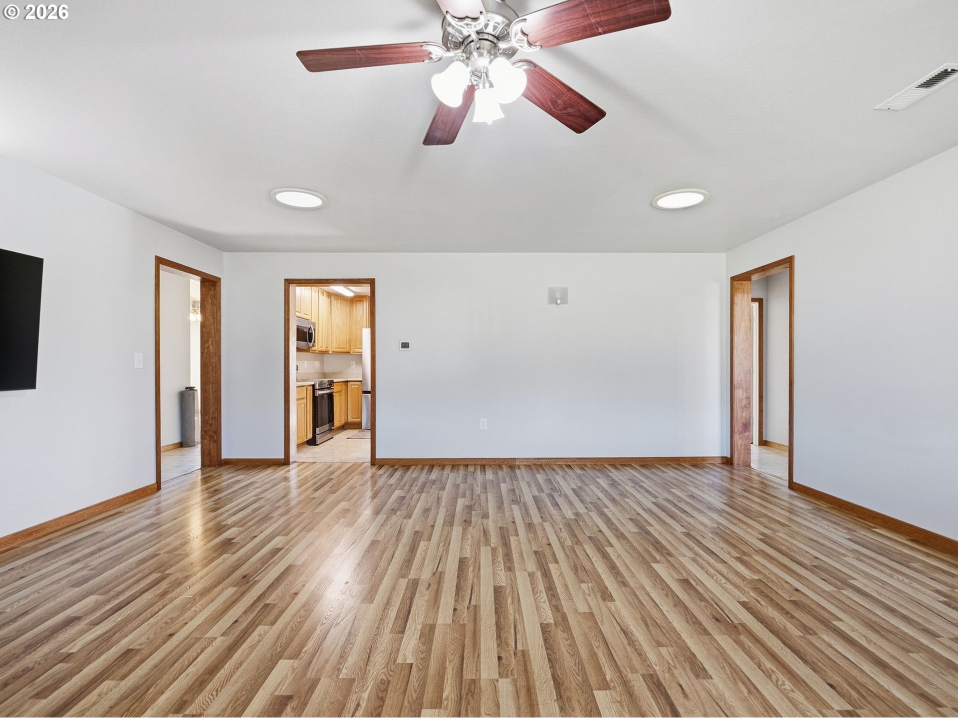 92938 Amie Loop Astoria, OR 97103 - Photo 23 of 42 a view of an empty room window and wooden floor