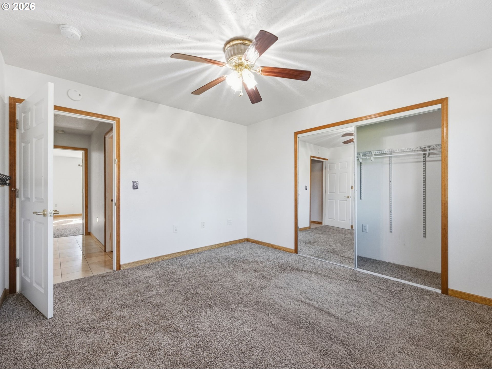 92938 Amie Loop Astoria, OR 97103 - Photo 25 of 42 a view of an empty room with chandelier fan