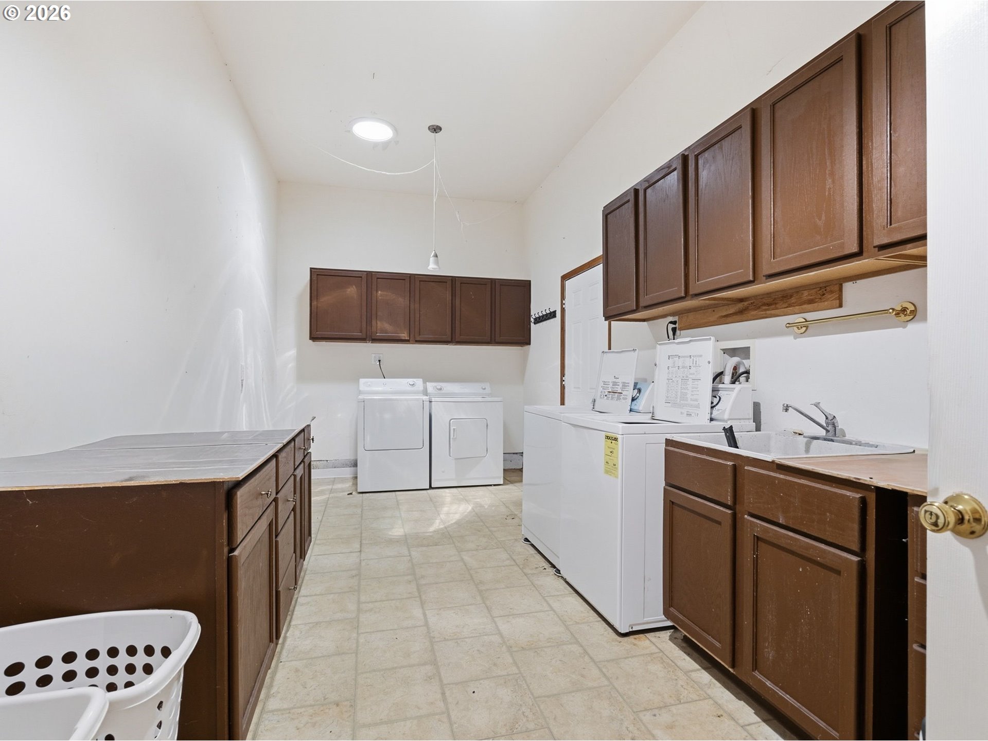 92938 Amie Loop Astoria, OR 97103 - Photo 33 of 42 a kitchen with a sink a stove and cabinets