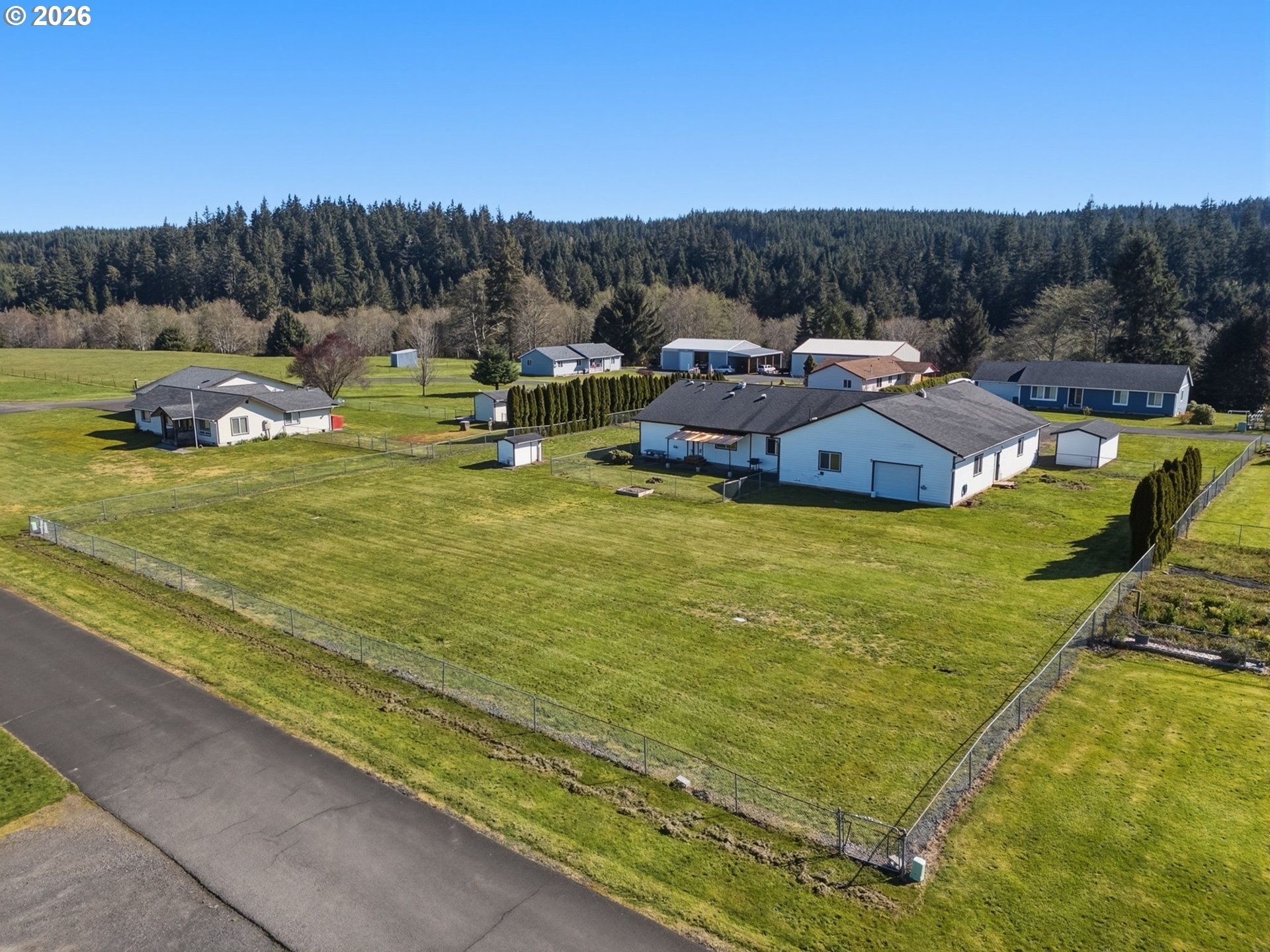 92938 Amie Loop Astoria, OR 97103 - Photo 4 of 42 a view of swimming pool and outdoor seating
