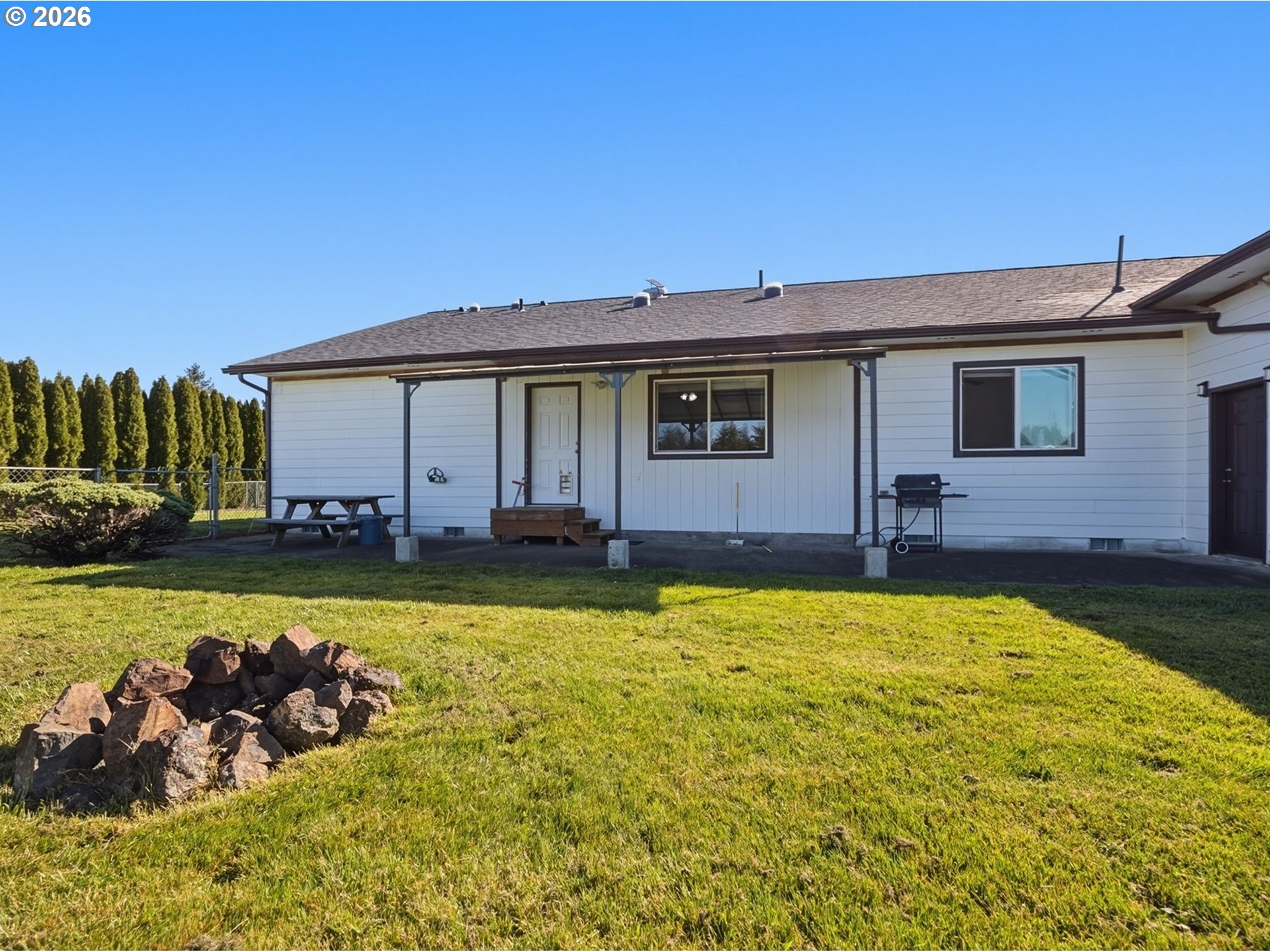 92938 Amie Loop Astoria, OR 97103 - Photo 5 of 42 a front view of house with yard and seating area