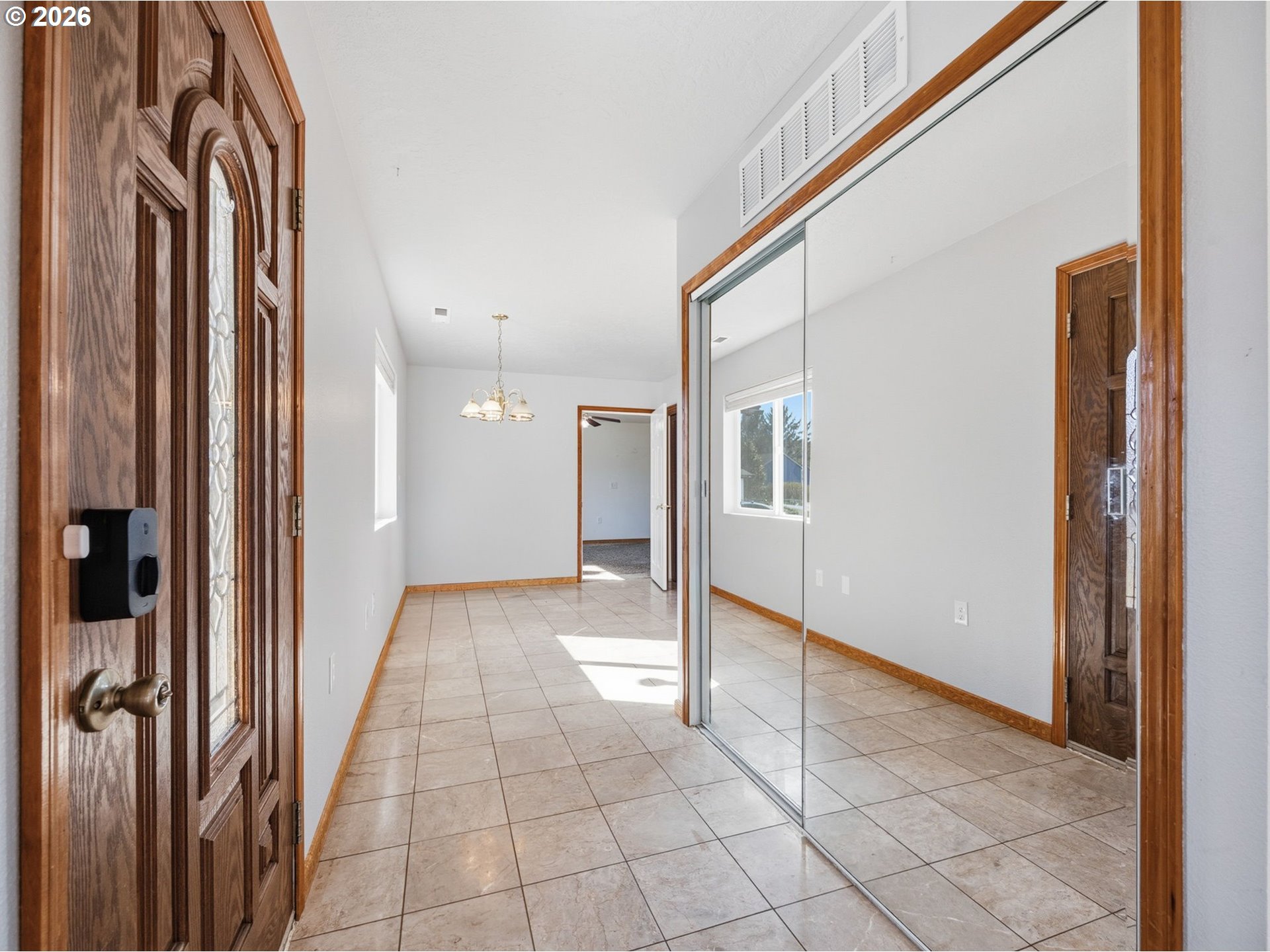 92938 Amie Loop Astoria, OR 97103 - Photo 7 of 42 a view of a hallway with wooden cabinets