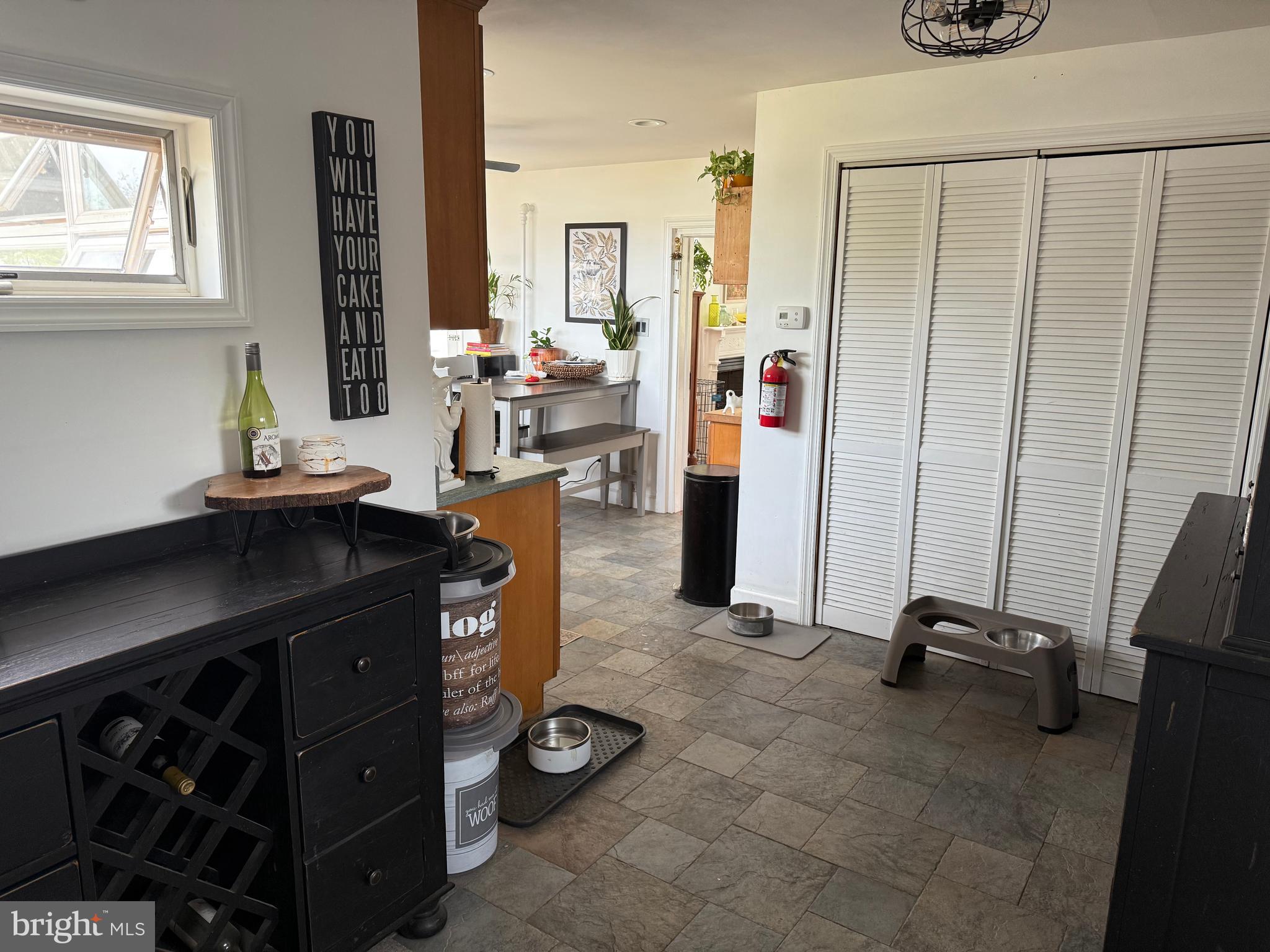 303 Baptist Road Newport, NJ 08345 - Photo 15 of 37 a room with furniture a window and gym equipment