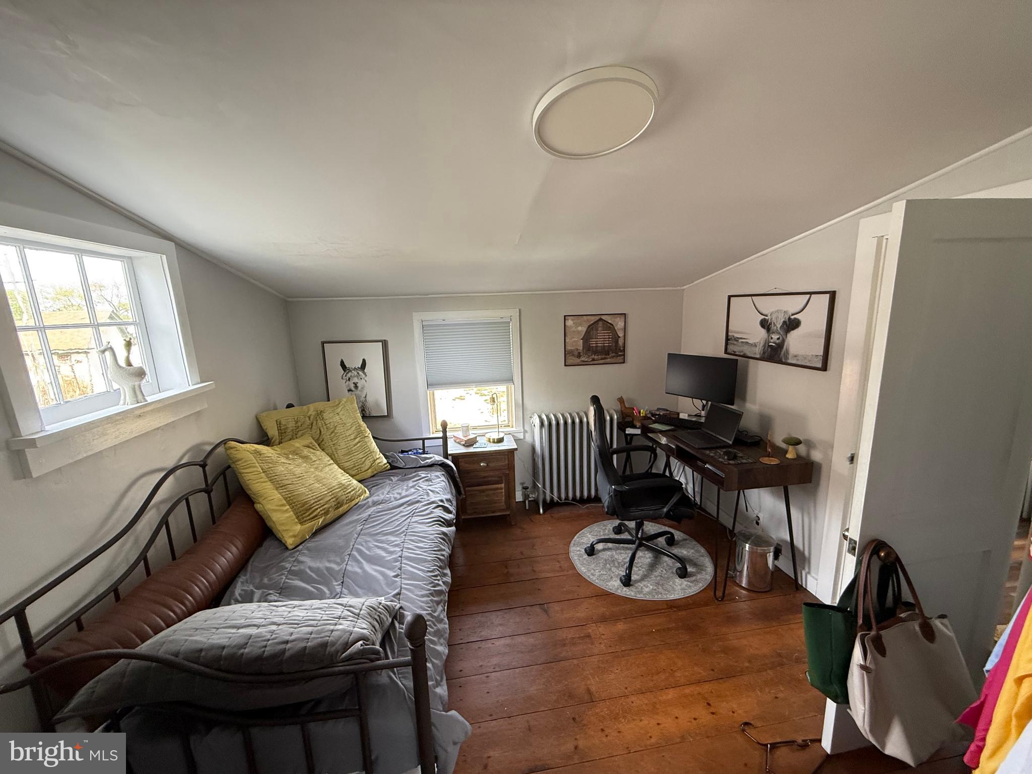 303 Baptist Road Newport, NJ 08345 - Photo 24 of 37 a living room with furniture a window and gym equipment