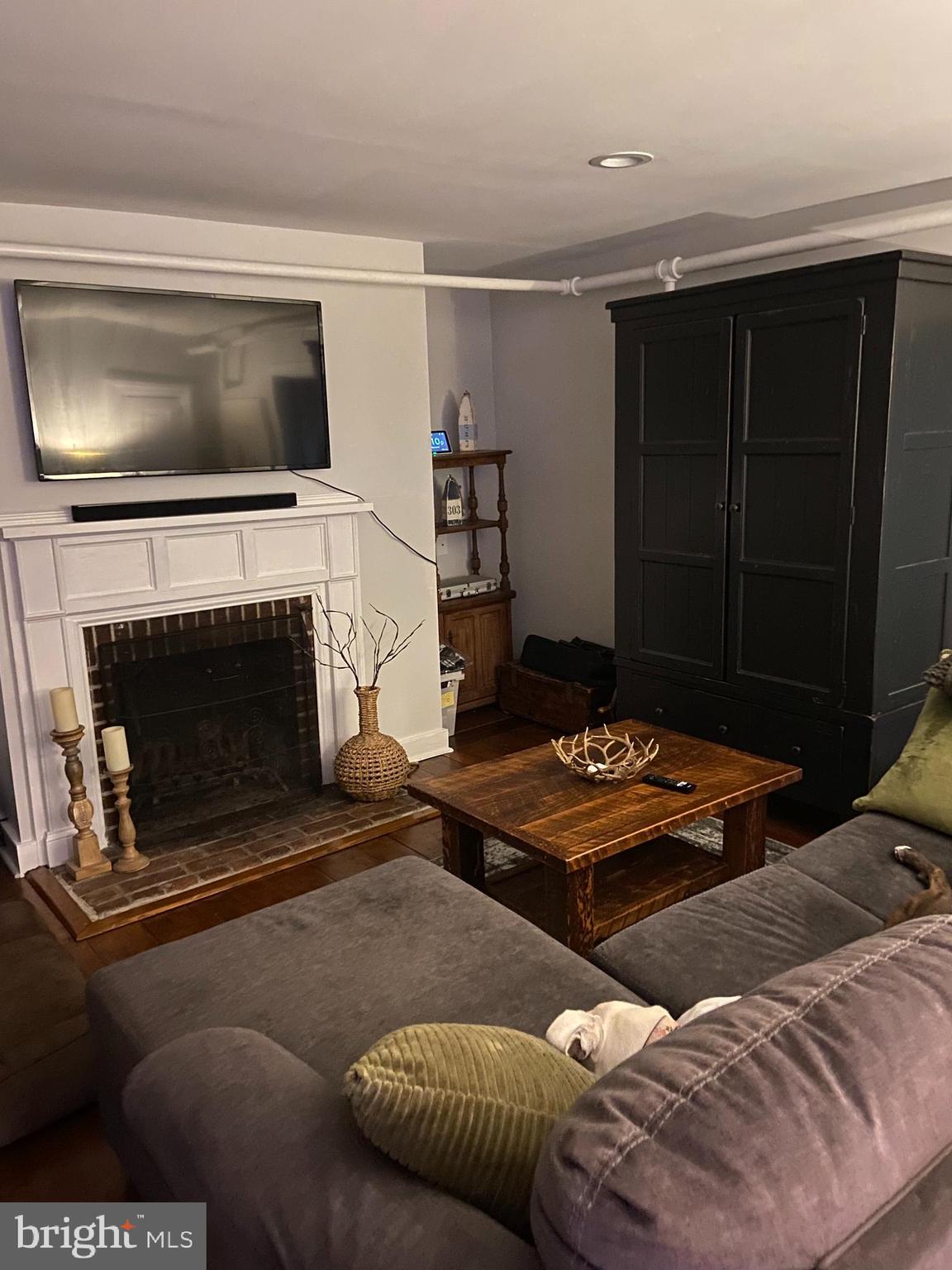 303 Baptist Road Newport, NJ 08345 - Photo 7 of 37 a living room with furniture and a fireplace