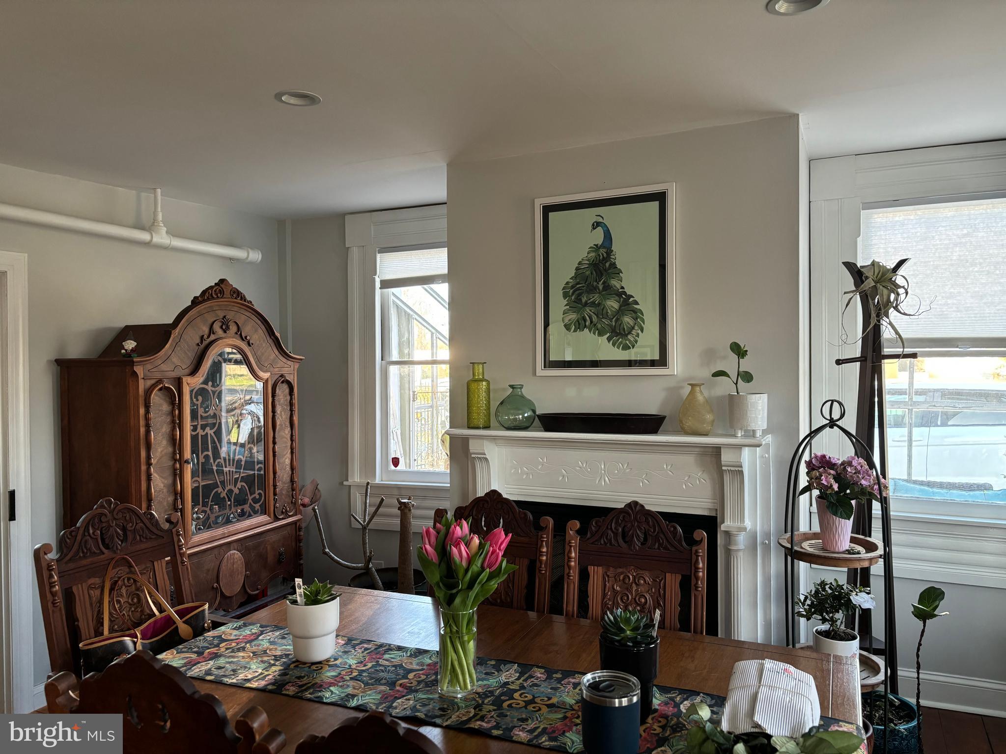 303 Baptist Road Newport, NJ 08345 - Photo 9 of 37 a living room with furniture a window and a fireplace