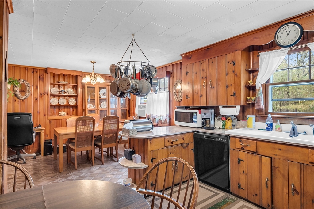 38 South Spencer Road Spencer, MA 01562 - Photo 2 of 14 a kitchen with lots of counter top space and dining table