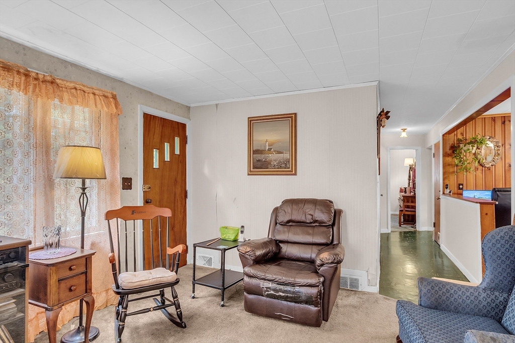 38 South Spencer Road Spencer, MA 01562 - Photo 7 of 14 a living room with furniture and a flat screen tv