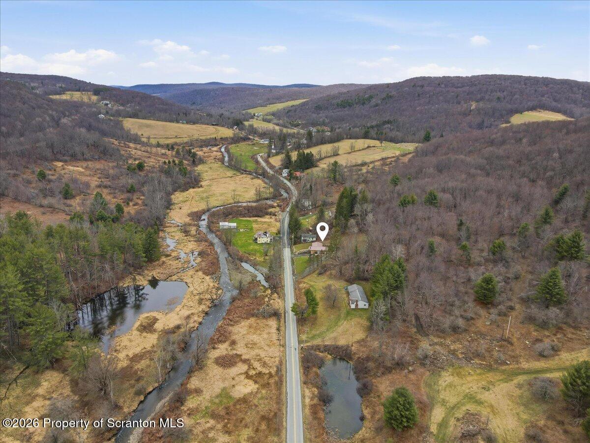 232 Starrucca Creek Road Starrucca, PA 18462 - Photo 64 of 64 a view of a city with mountain view