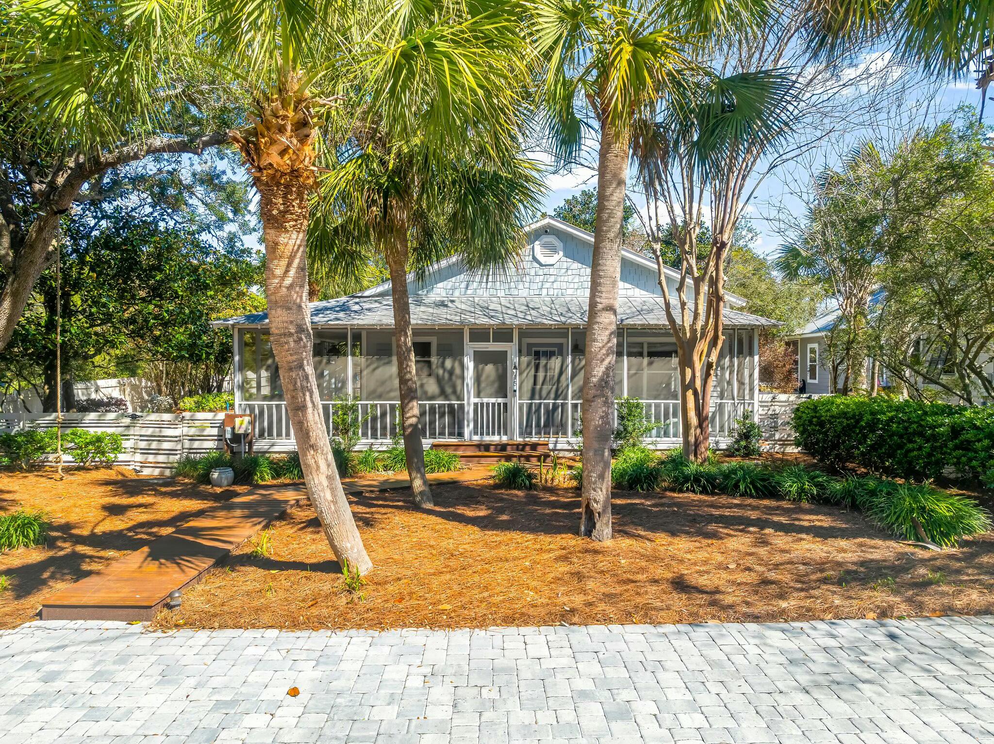 15 Maple Street Santa Rosa Beach, FL 32459 - Photo 1 of 34 a view of a house with a swimming pool