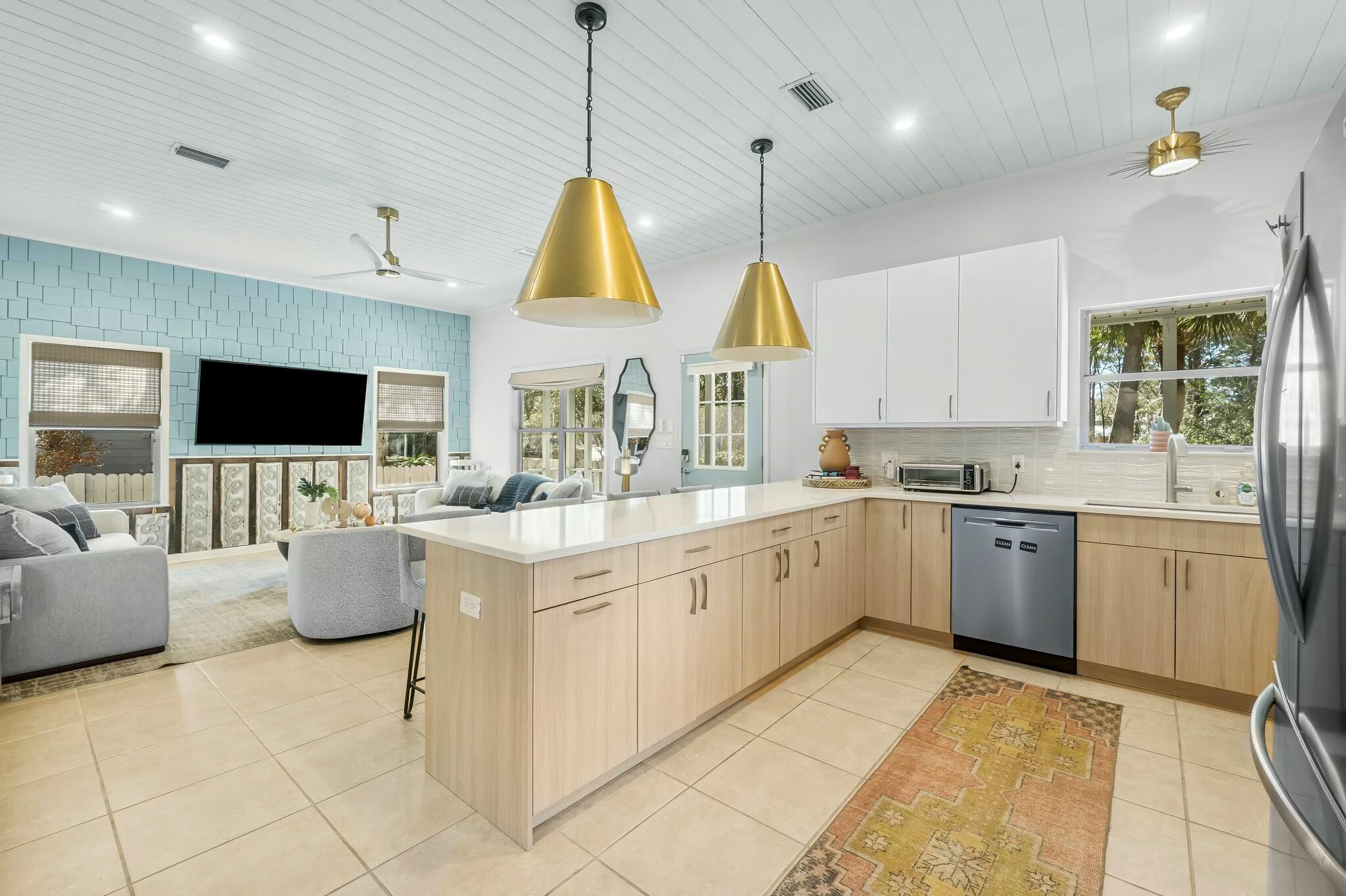15 Maple Street Santa Rosa Beach, FL 32459 - Photo 7 of 34 a kitchen with a sink counter top space appliances and cabinets