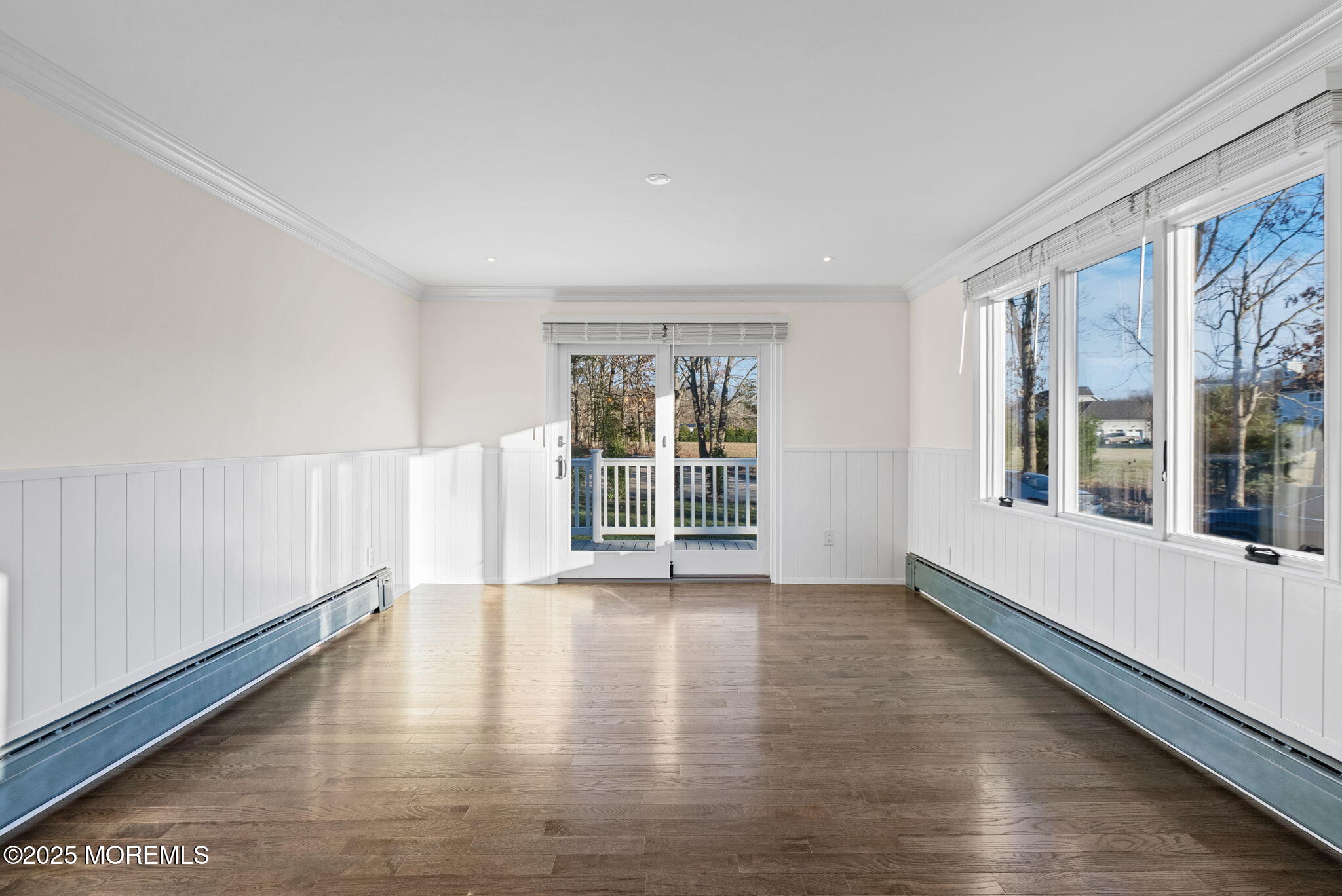 458 Newtons Corner Road Howell, NJ 07731 - Photo 11 of 44 a view of an empty room with wooden floor and a window