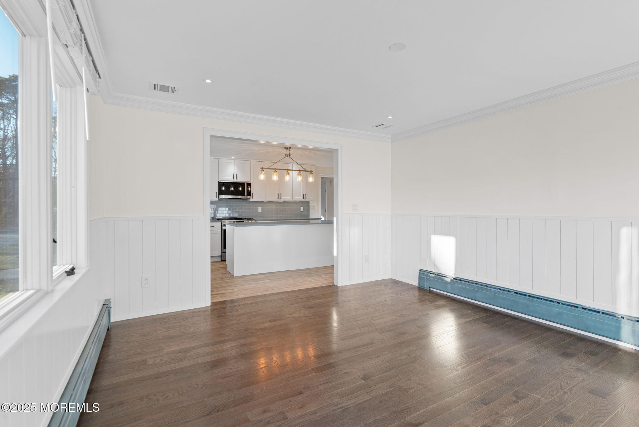 458 Newtons Corner Road Howell, NJ 07731 - Photo 12 of 44 a view of a kitchen with wooden floor and a window