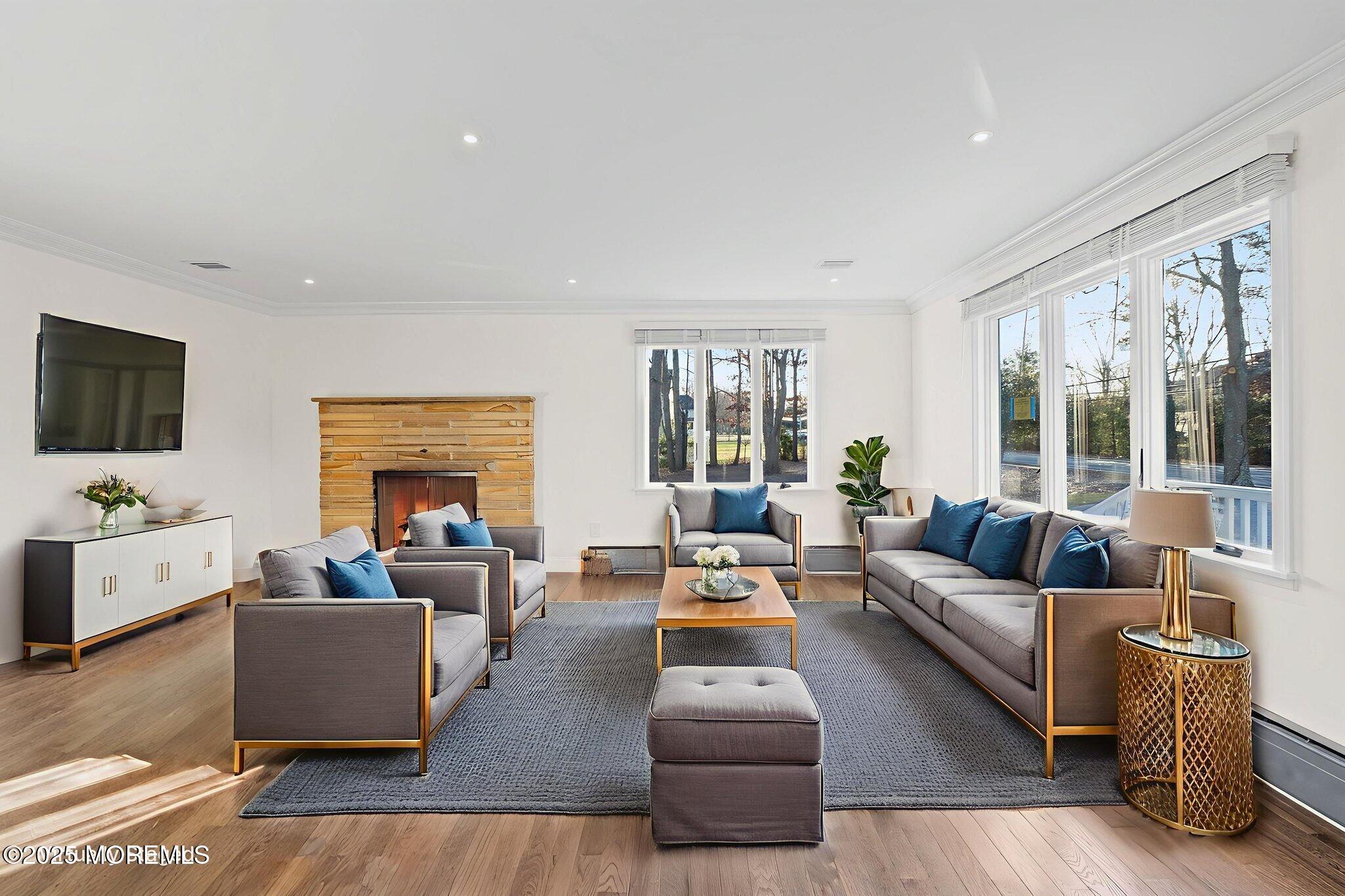 458 Newtons Corner Road Howell, NJ 07731 - Photo 14 of 44 a living room with furniture flat screen tv and a large window