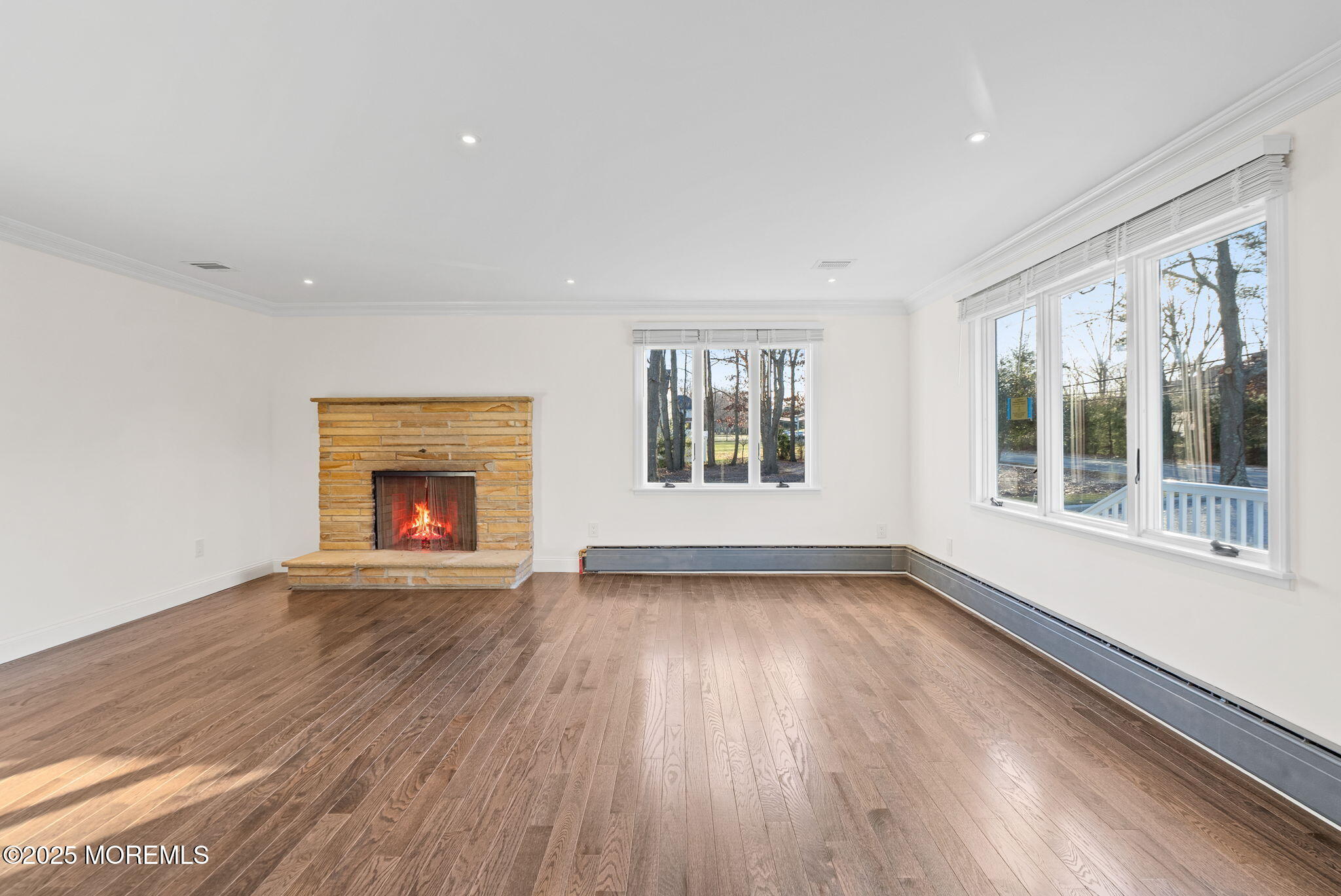 458 Newtons Corner Road Howell, NJ 07731 - Photo 15 of 44 a view of an empty room with wooden floor and a window