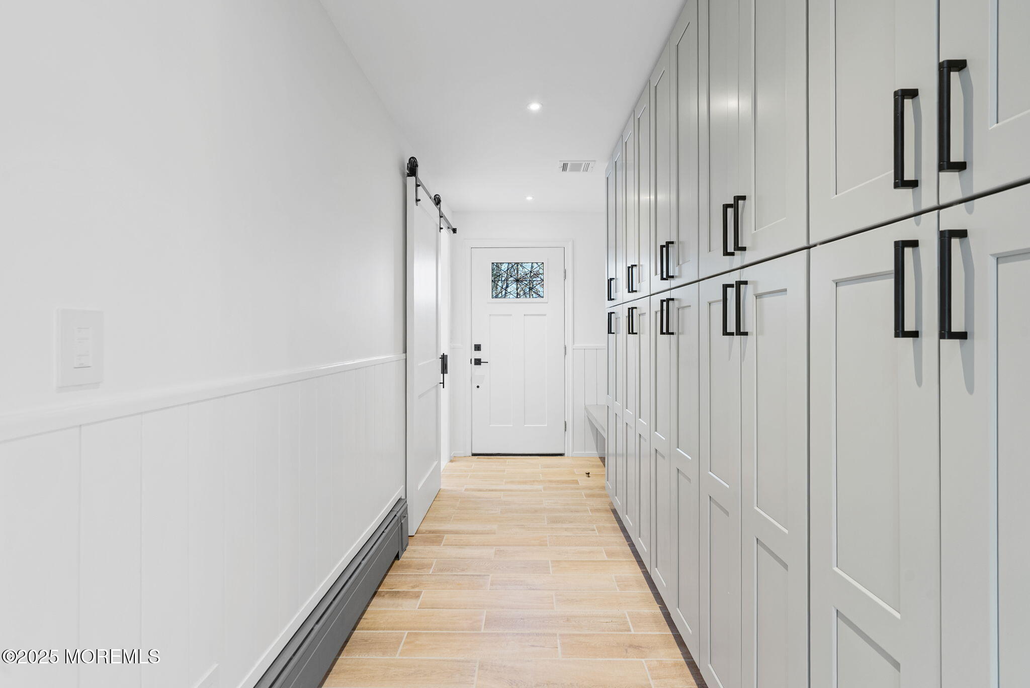 458 Newtons Corner Road Howell, NJ 07731 - Photo 17 of 44 a view of a hallway with wooden floor