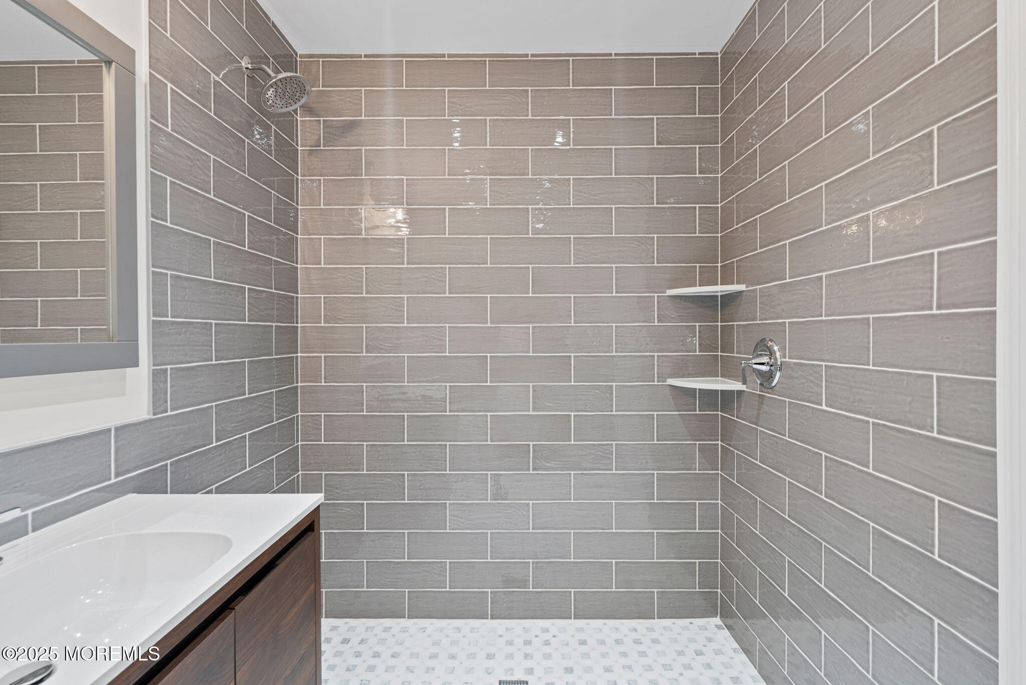 458 Newtons Corner Road Howell, NJ 07731 - Photo 25 of 44 a bathroom with a sink and a shower