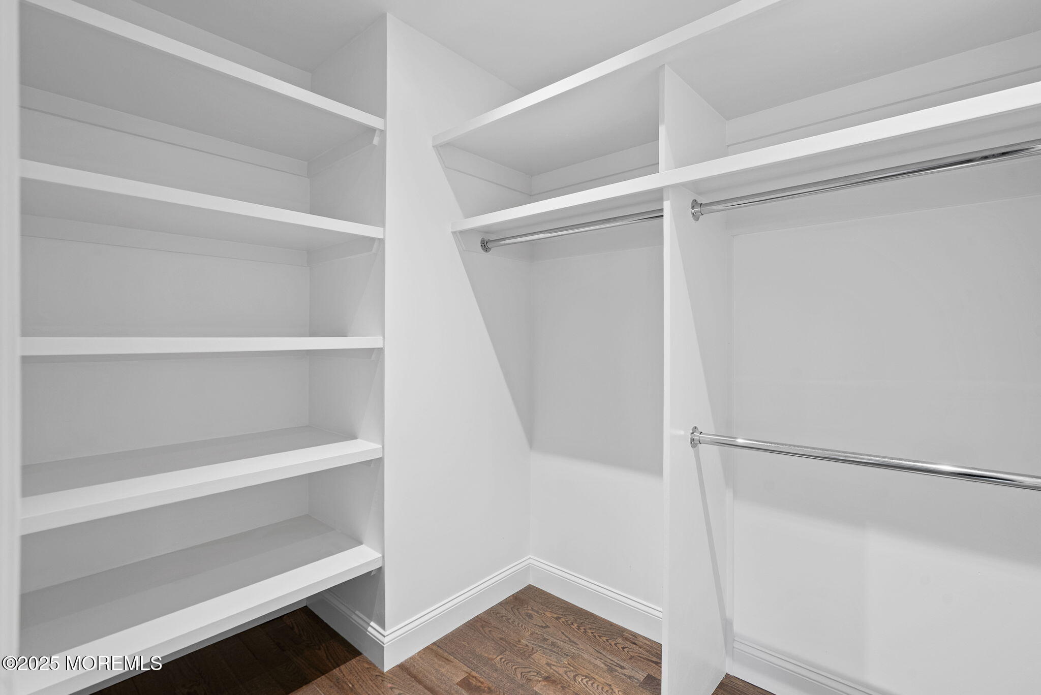 458 Newtons Corner Road Howell, NJ 07731 - Photo 29 of 44 a view of walk in closet with empty racks