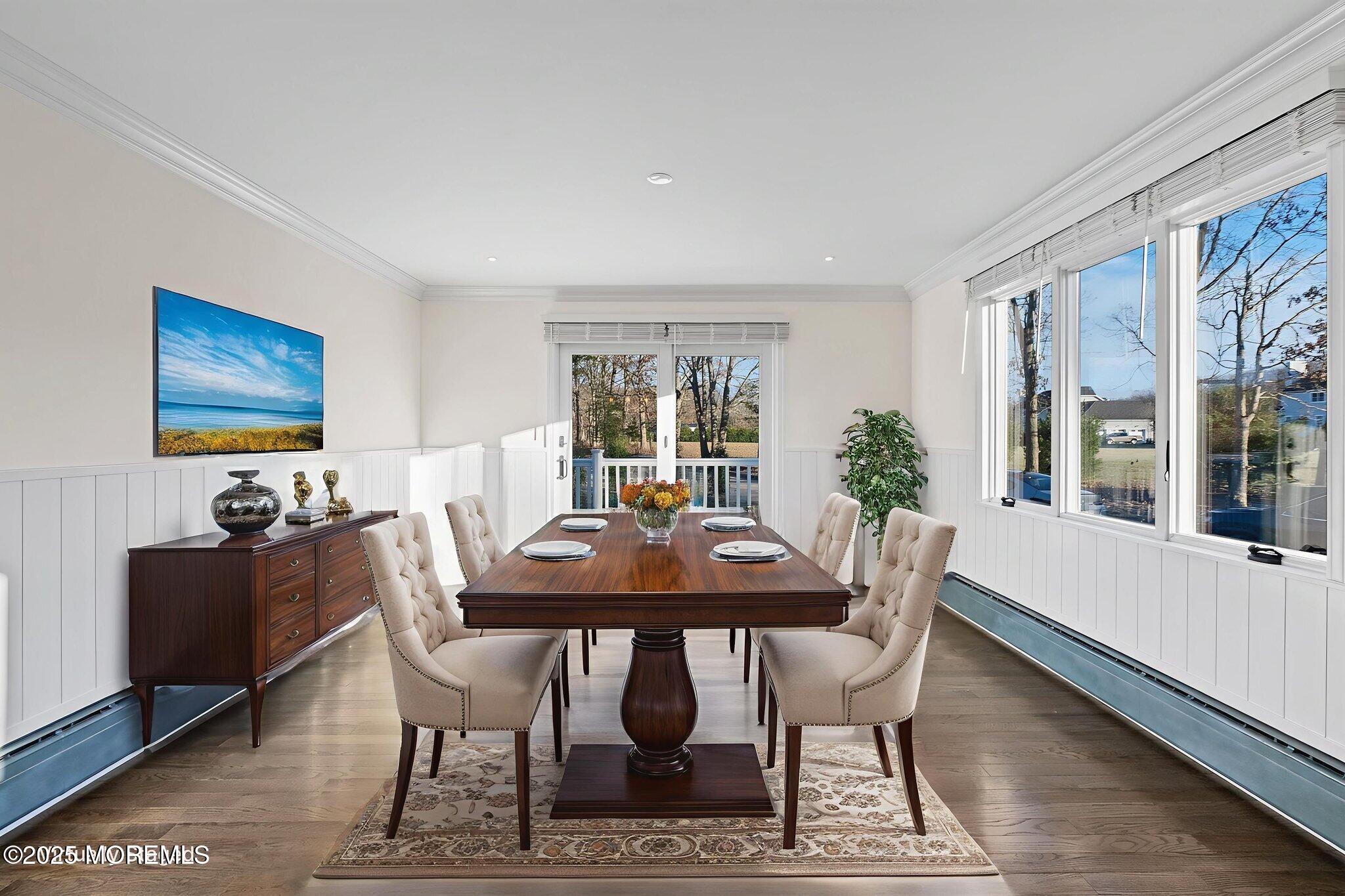 458 Newtons Corner Road Howell, NJ 07731 - Photo 10 of 44 a view of a dining room with furniture window and wooden floor