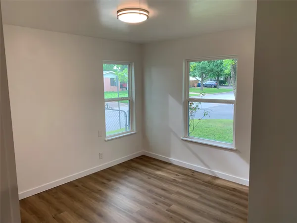 a bathroom with a toilet and a bathtub