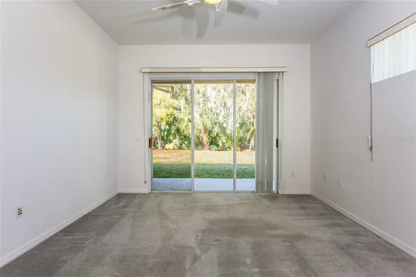an empty room with an outdoor view