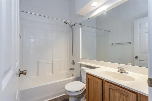 a bathroom with a sink and a window