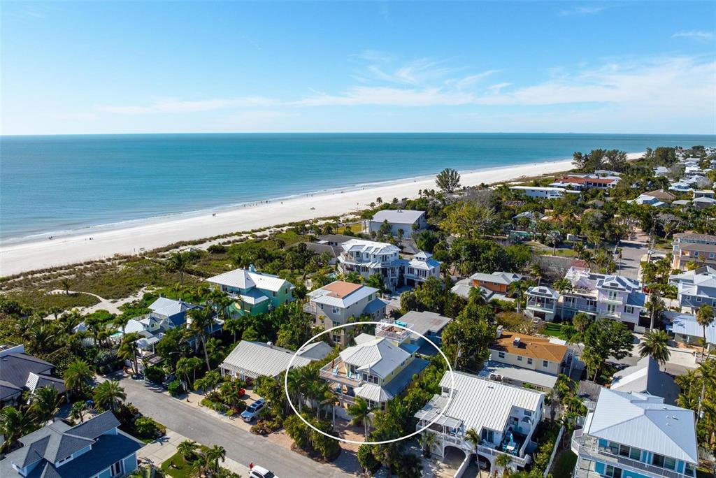 106 79th Street Holmes Beach, FL 34217 - Photo 87 of 98 an aerial view of multiple house