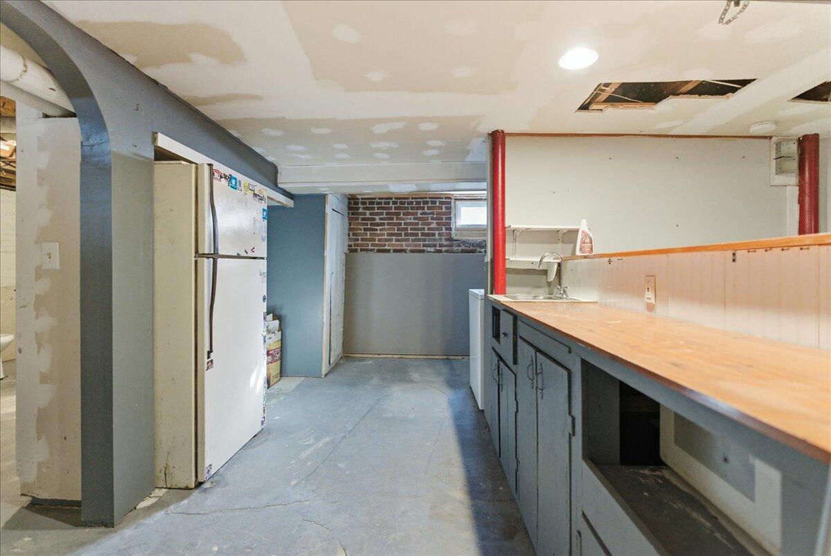 23 Janelle Street Lewiston, ME 04240 - Photo 33 of 54 Basement Bar