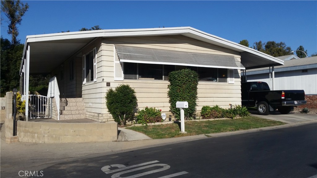 a front view of a house with garage
