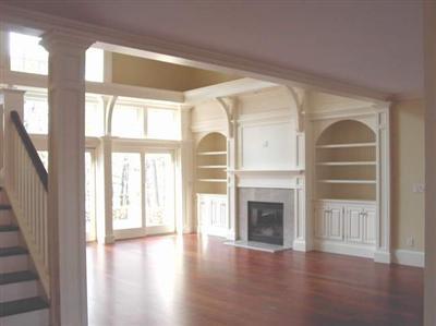 Undisclosed Address Marstons Mills, MA 02648 - Photo 3 of 11 a view of an empty room with wooden floor and a window
