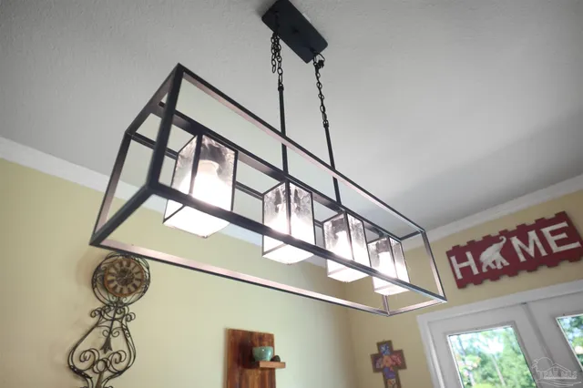 a view of a two chairs on the roof deck