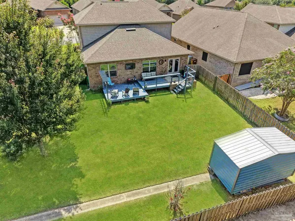 a view of a back yard of the house