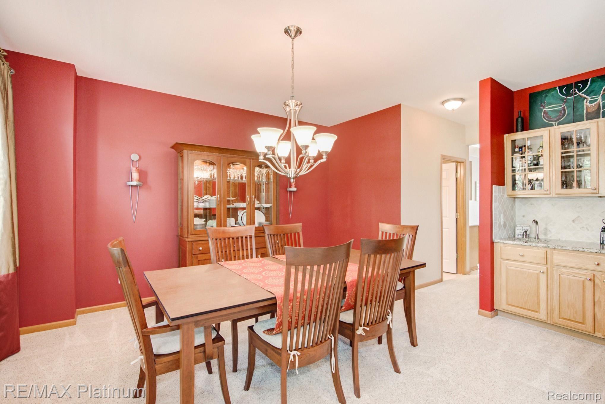 Dining room with wet bar- granite and tumbled marble backsplash