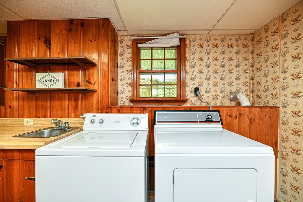 122 Ferry Road Salisbury, MA 01952 - Photo 33 of 40 a utility room with dryer and washer