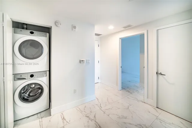 a view of living room and kitchen