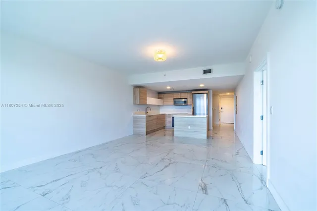 a large bathroom with a large tub and sink