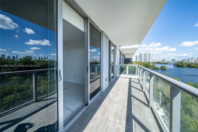 a view of balcony with furniture