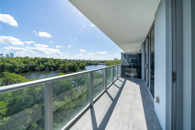 a view of a lake from a balcony
