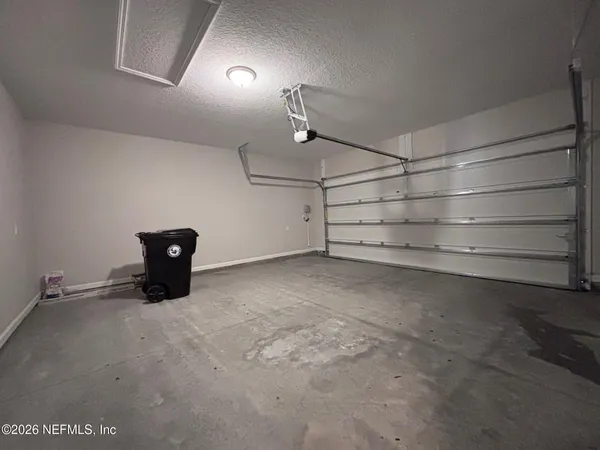a room with cabinets and dust bin