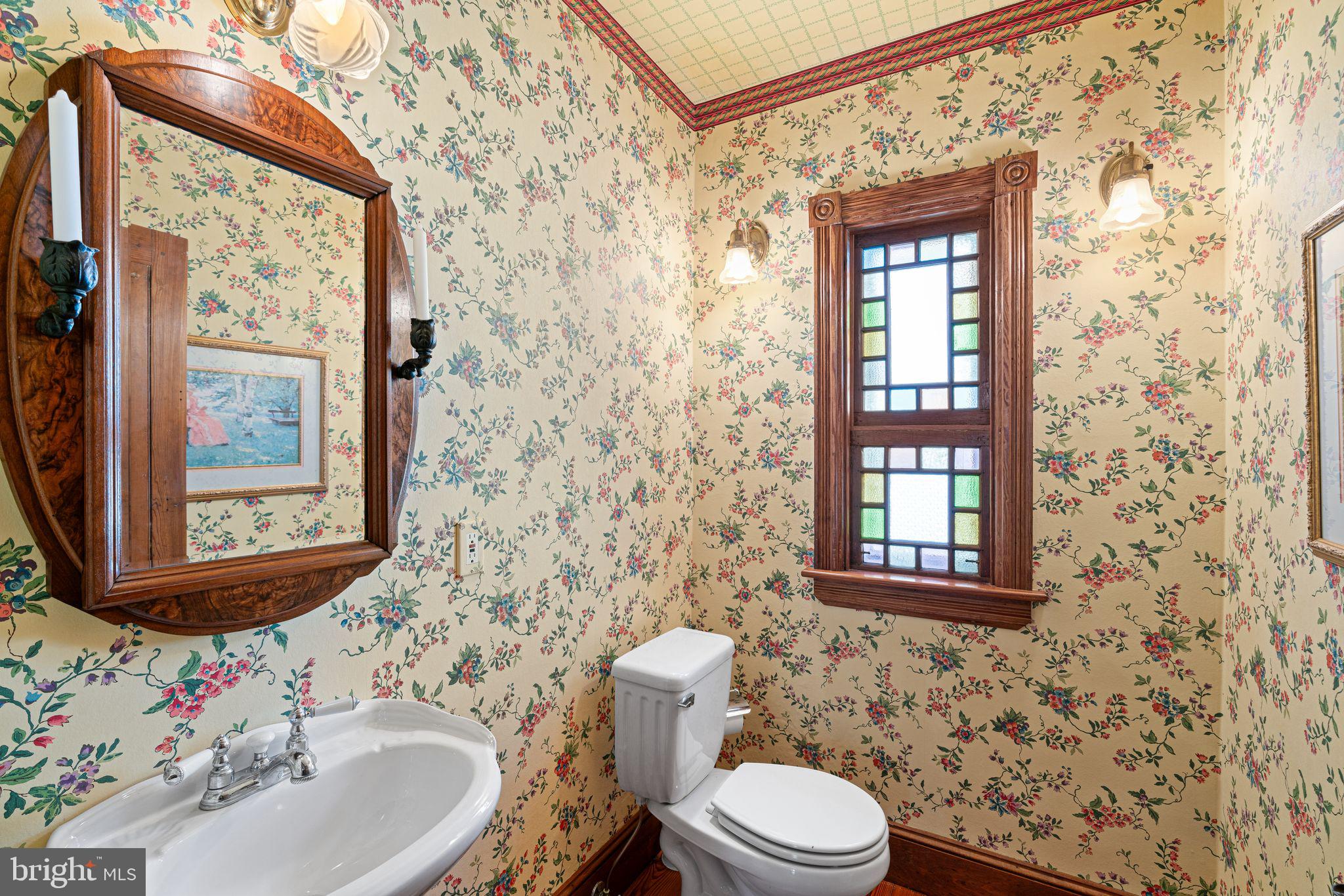 801 Cox Road Moorestown, NJ 08057 - Photo 23 of 110 a bathroom with a sink a toilet and shower curtain