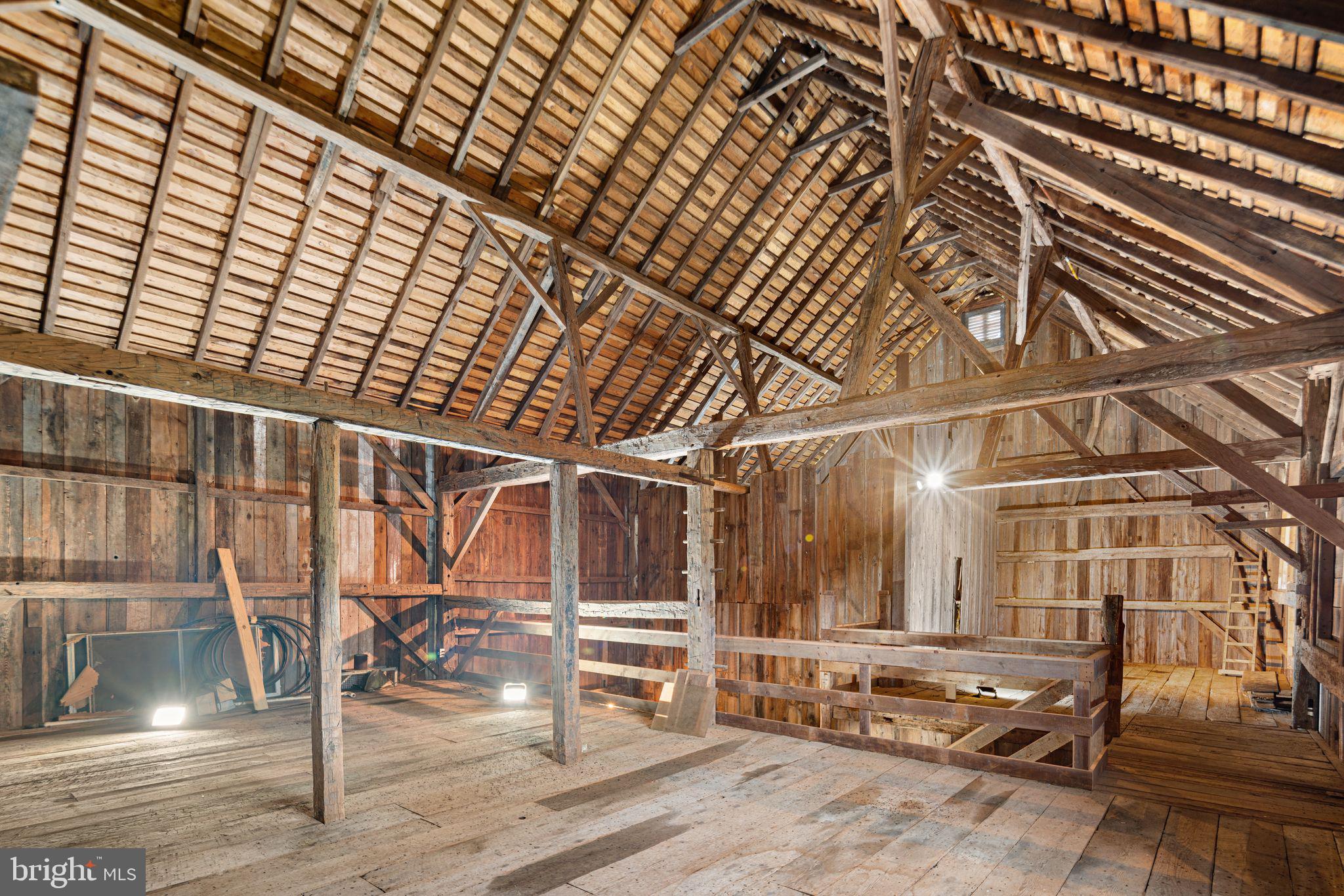 801 Cox Road Moorestown, NJ 08057 - Photo 76 of 110 a view of an empty room with wooden floor