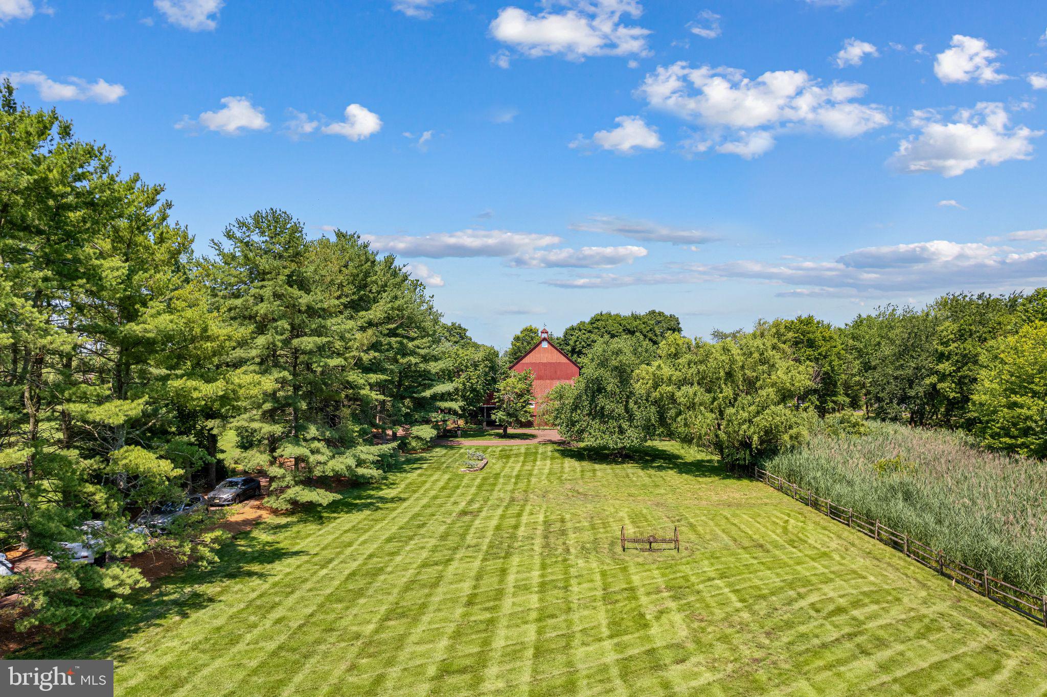 801 Cox Road Moorestown, NJ 08057 - Photo 90 of 110 a view of a swimming pool with an outdoor space and seating area